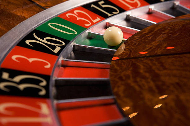 American Roulette wheel with 38 pockets displayed in live-dealer studio